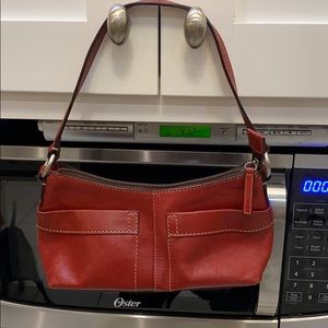 Red fossil purse.